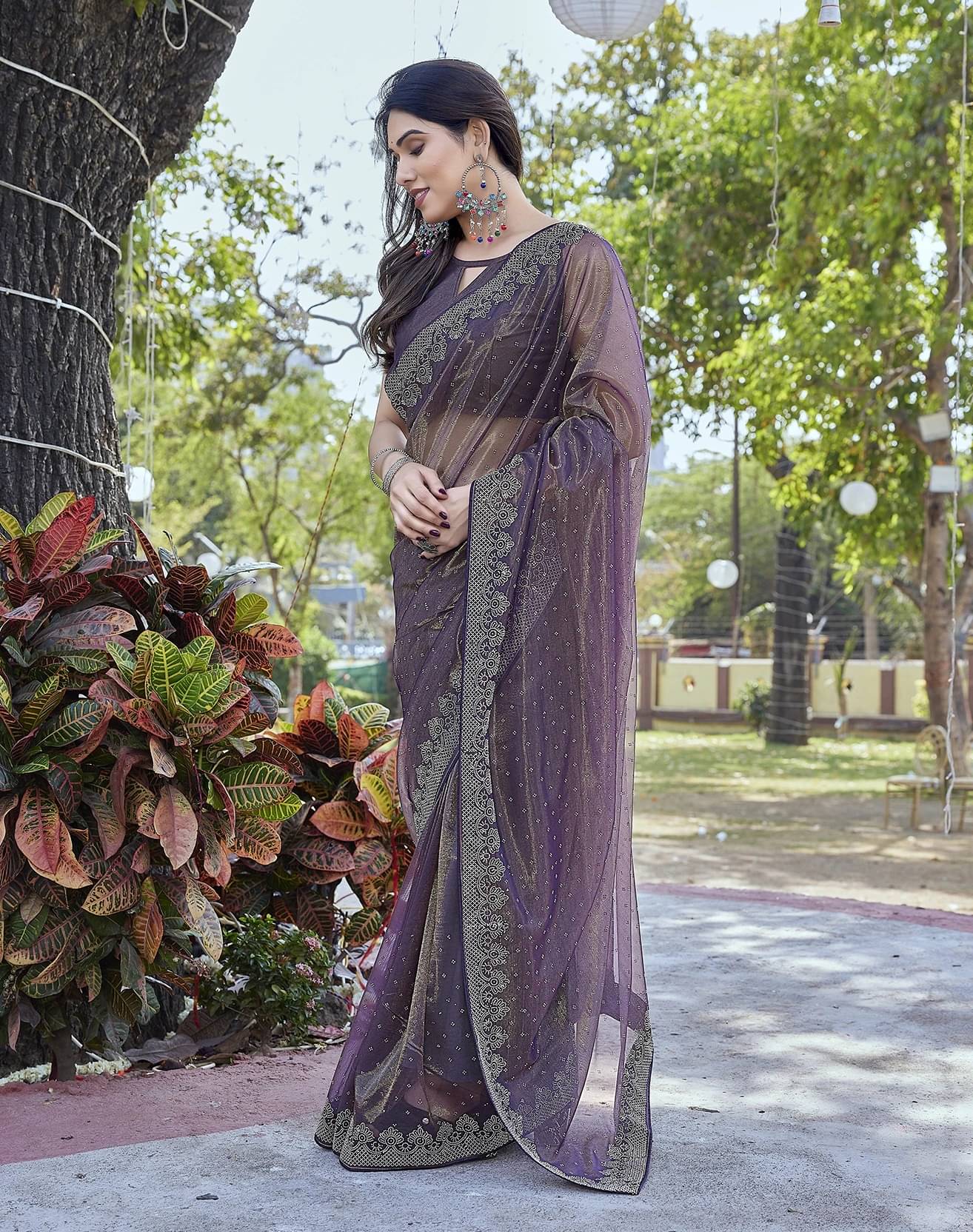 Yashika Tissue Embellished Regular Saree With Unstitched Blouse Piece ( Purple ) Yashika Tissue Embellished Regular Saree With Unstitched Blouse Piece ( Purple )