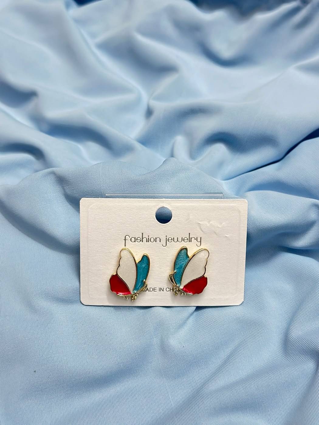     			ADOREX Maroon Stud Earrings ( Pack of 1 )