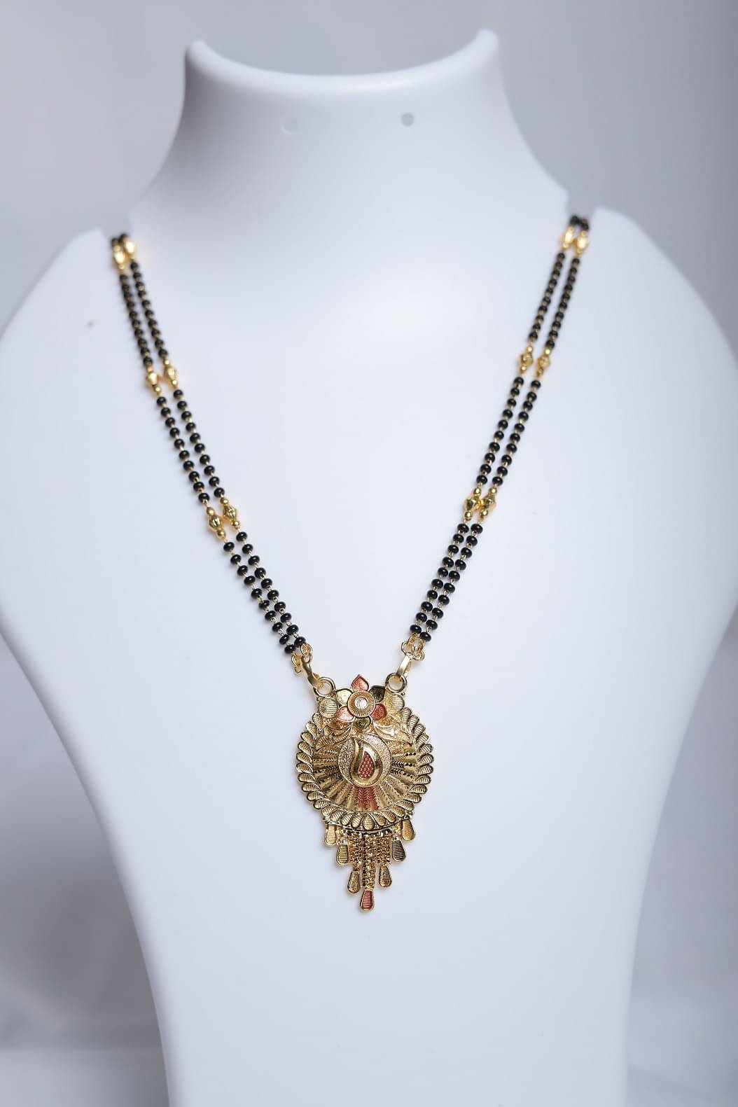     			Madhuram Fashion Golden Mangalsutra ( Pack of 1 )