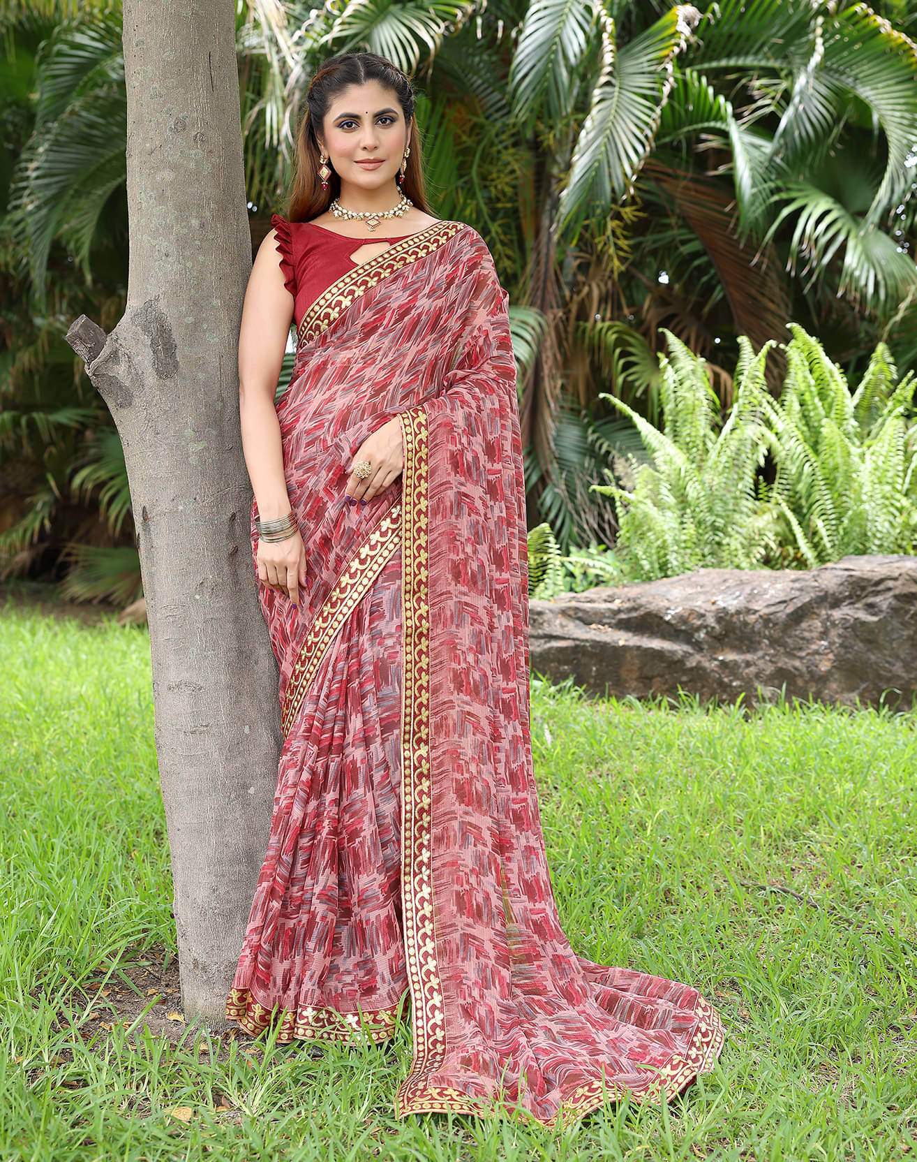     			Yashika Georgette Printed Regular Saree With Unstitched Blouse Piece ( Maroon )