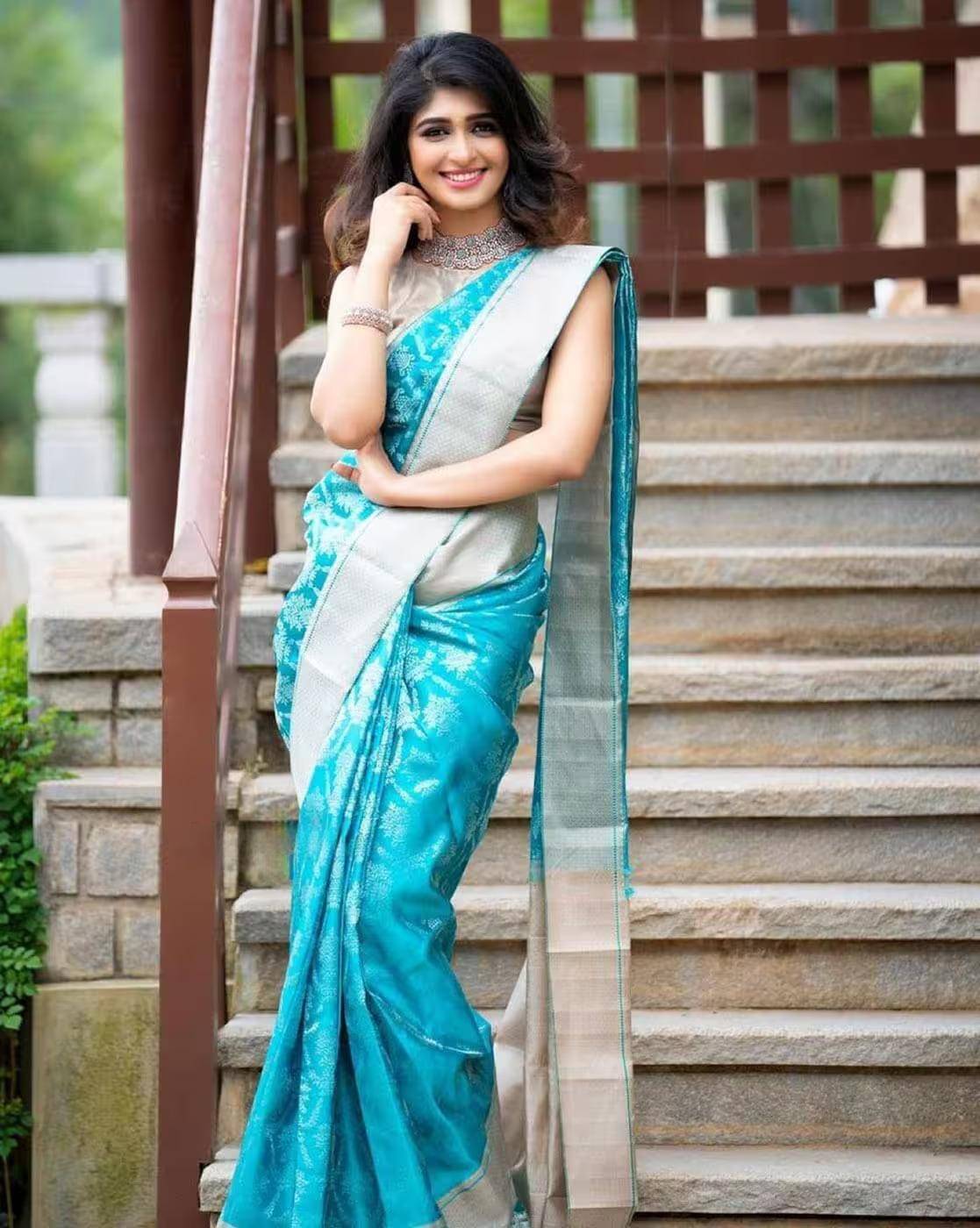 Yashika Silk Blend Embellished Banarasi saree With Unstitched Blouse Piece ( Blue ) Yashika Silk Blend Embellished Banarasi saree With Unstitched Blouse Piece ( Blue )