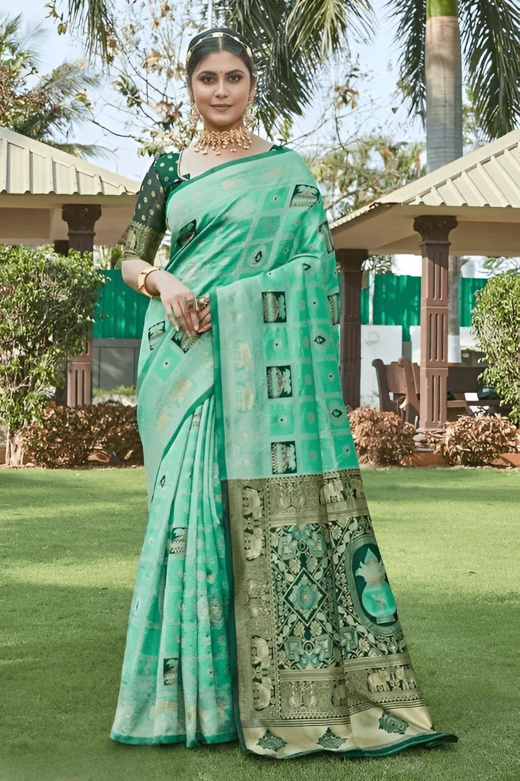 Yashika Silk Blend Embroidered Banarasi saree With Unstitched Blouse Piece ( Teal ) Yashika Silk Blend Embroidered Banarasi saree With Unstitched Blouse Piece ( Teal )