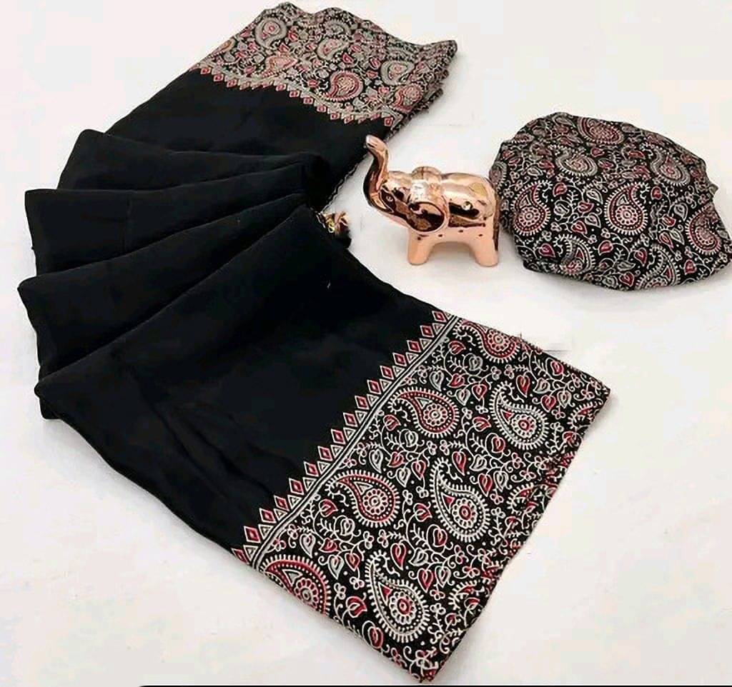 Pionex Crepe Printed Regular Saree With Unstitched Blouse Piece ( Black ) Pionex Crepe Printed Regular Saree With Unstitched Blouse Piece ( Black )