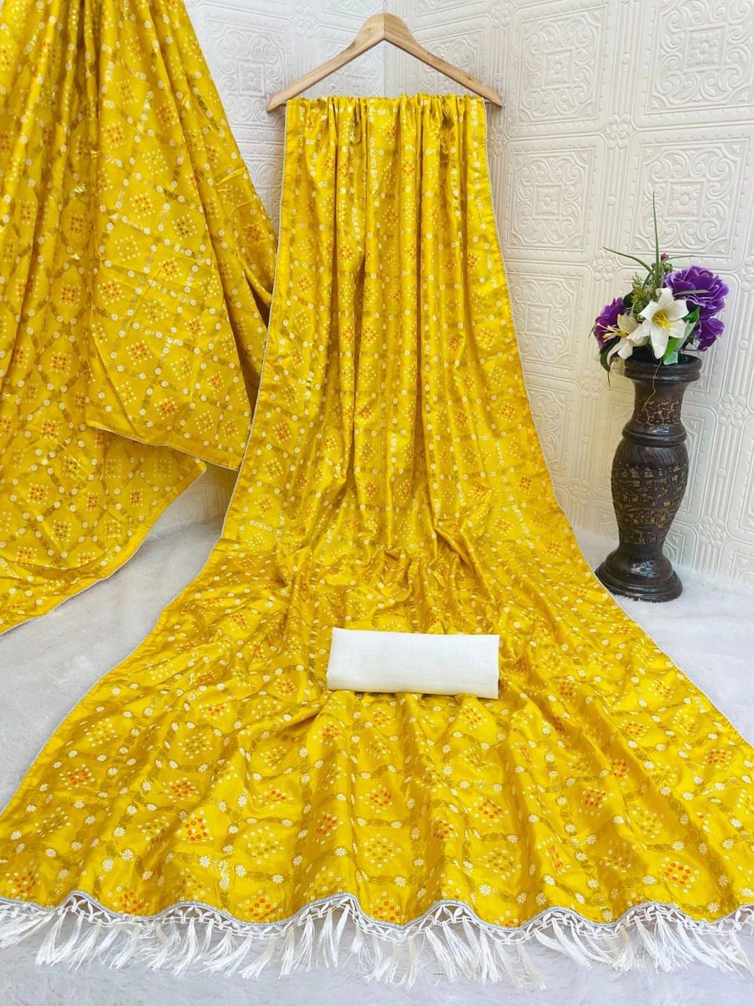Pionex Silk Blend Printed Bandhani Sarees With Unstitched Blouse Piece ( Yellow ) Pionex Silk Blend Printed Bandhani Sarees With Unstitched Blouse Piece ( Yellow )