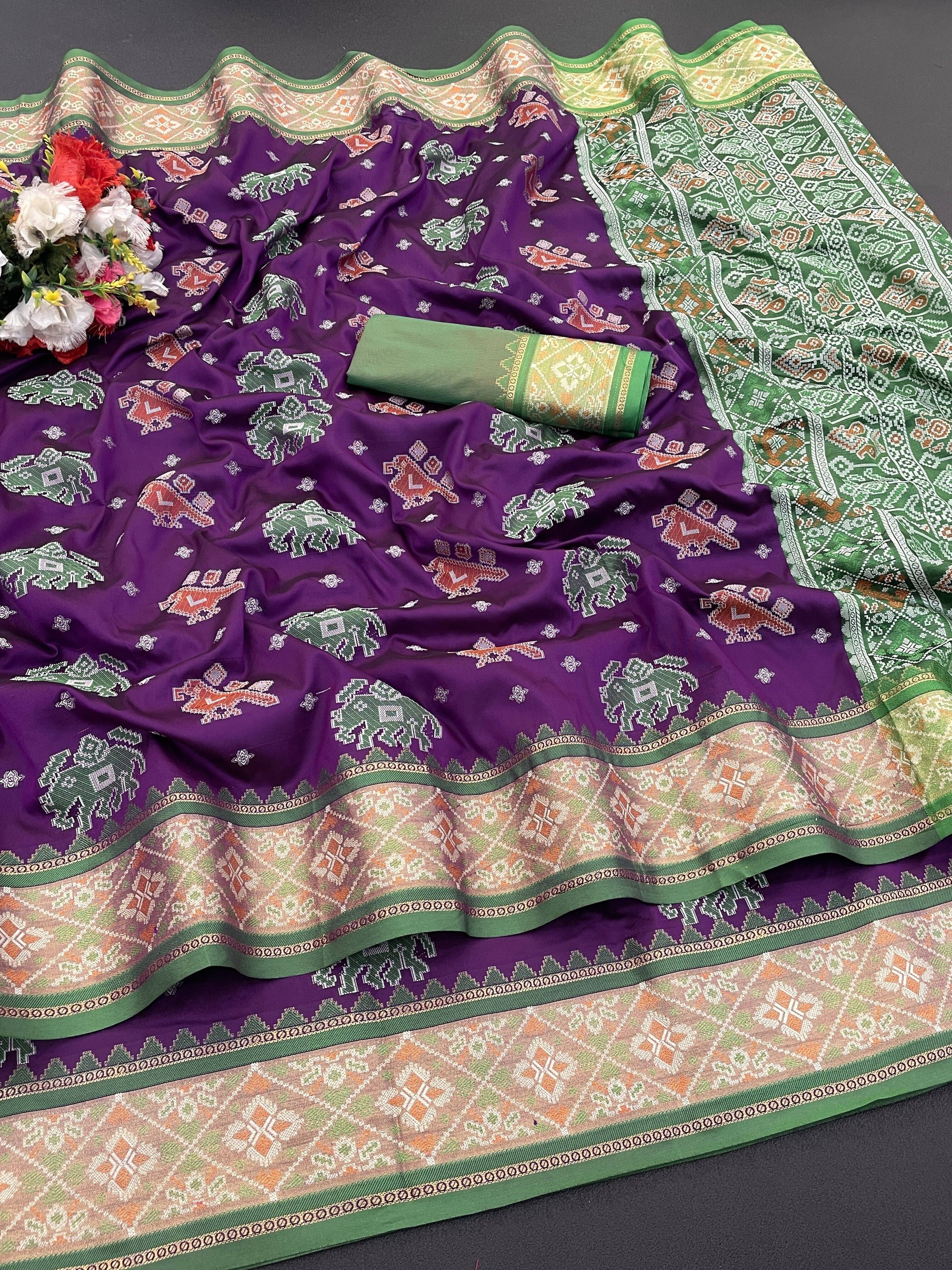 Pionex Silk Woven Patola Saree With Unstitched Blouse Piece ( Purple ) Pionex Silk Woven Patola Saree With Unstitched Blouse Piece ( Purple )