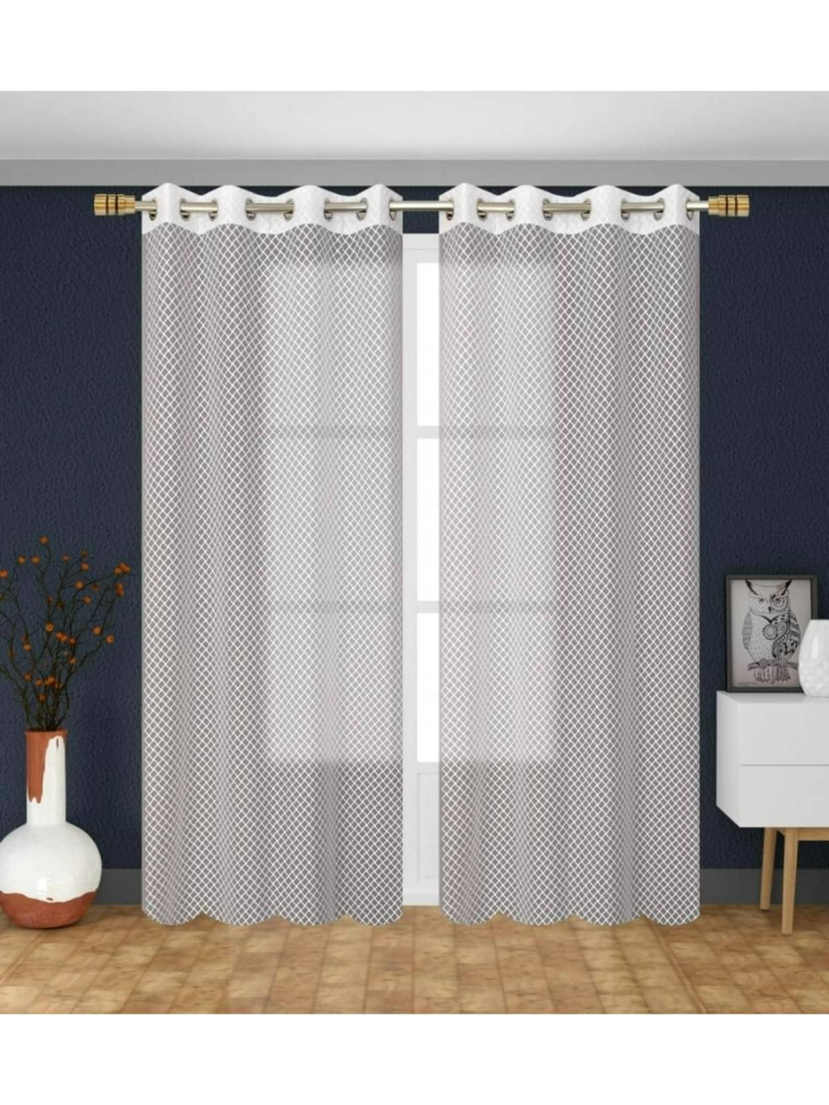 UrbanArts Abstract Semi-Transparent Eyelet Curtain 9 ft ( Pack of 2 ) - White UrbanArts Abstract Semi-Transparent Eyelet Curtain 9 ft ( Pack of 2 ) - White