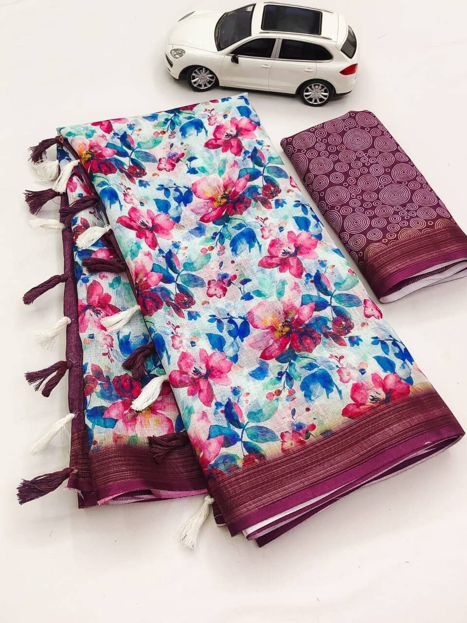     			dravya womens Linen Printed Banarasi saree With Unstitched Blouse Piece ( Purple )