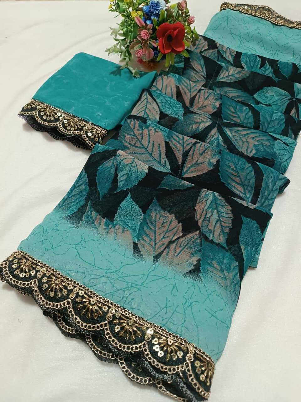 PARVANYA FASHION HUB Georgette Printed Regular Saree With Unstitched Blouse Piece ( Sky Blue ) PARVANYA FASHION HUB Georgette Printed Regular Saree With Unstitched Blouse Piece ( Sky Blue )