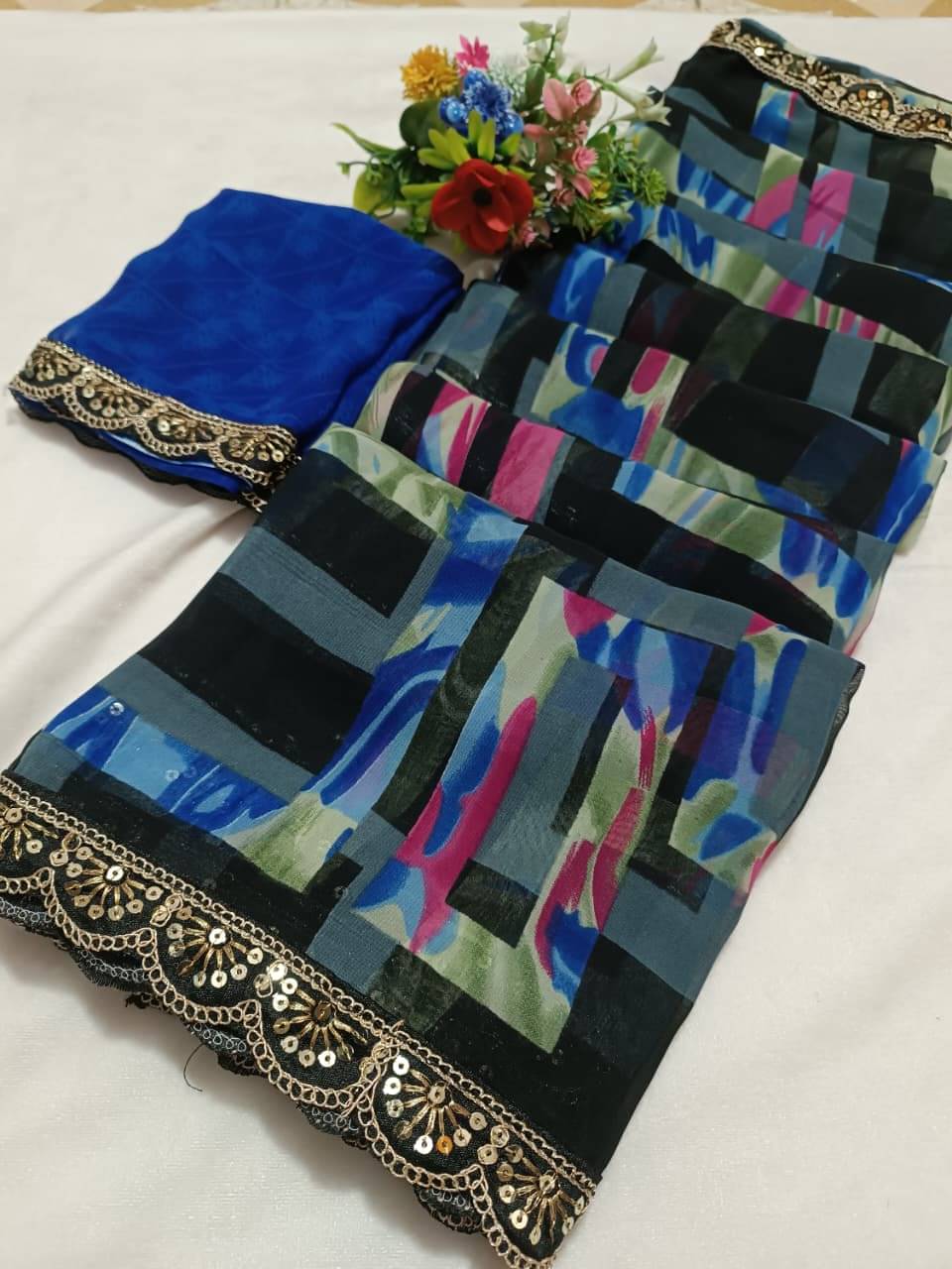 PARVANYA FASHION HUB Georgette Printed Regular Saree With Unstitched Blouse Piece ( Blue ) PARVANYA FASHION HUB Georgette Printed Regular Saree With Unstitched Blouse Piece ( Blue )