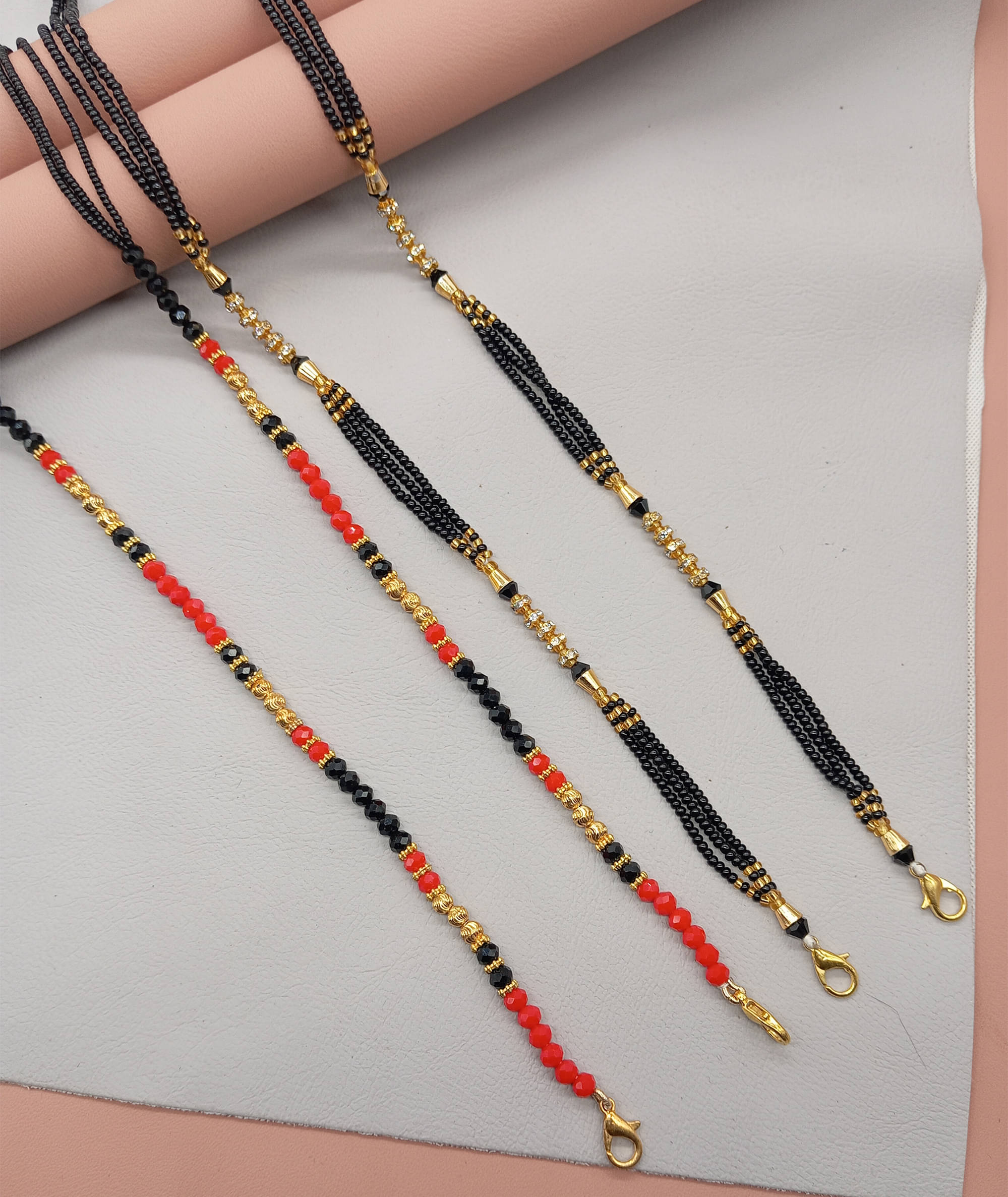 SHANKHRAJ MA LL Golden Mangalsutra ( Pack of 2 ) SHANKHRAJ MA LL Golden Mangalsutra ( Pack of 2 )