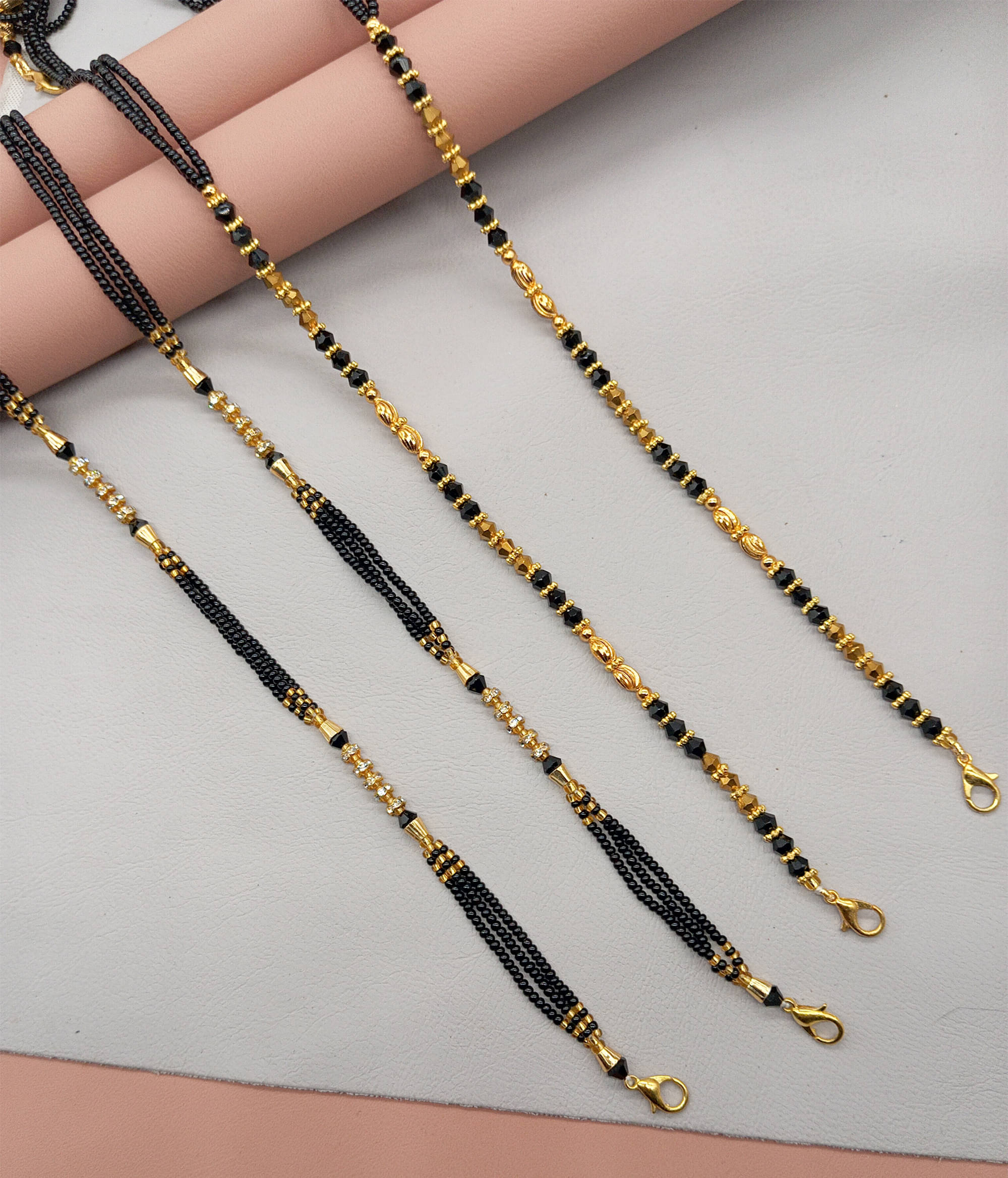     			SHANKHRAJ MA LL Golden Mangalsutra ( Pack of 2 )