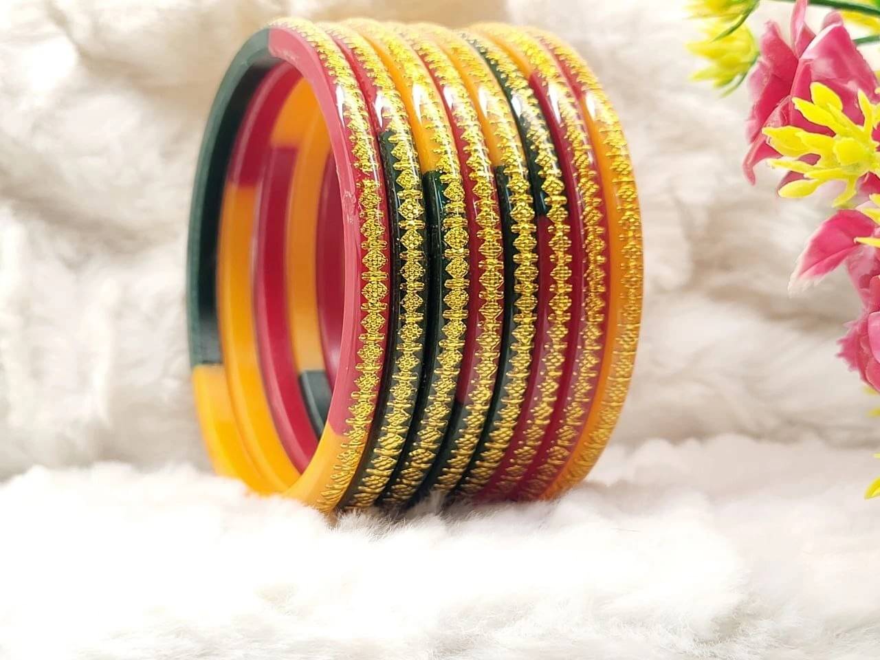     			DHANOTIYA Multicolor Bangle Set ( Pack of 8 )