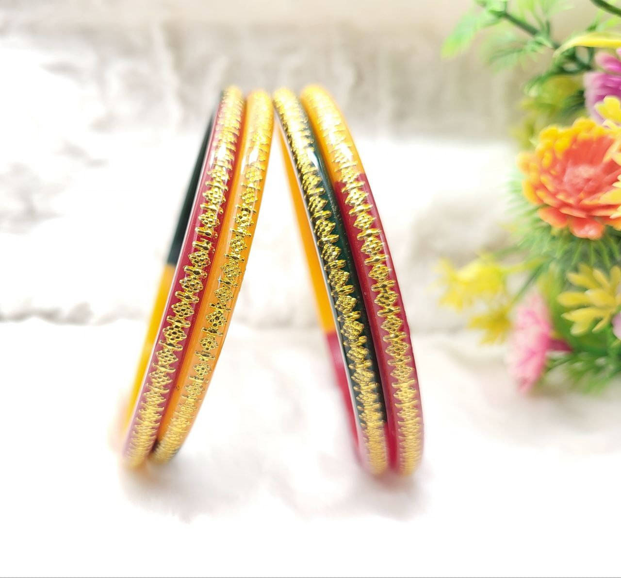 DHANOTIYA Multicolor Bangle Set ( Pack of 4 ) DHANOTIYA Multicolor Bangle Set ( Pack of 4 )
