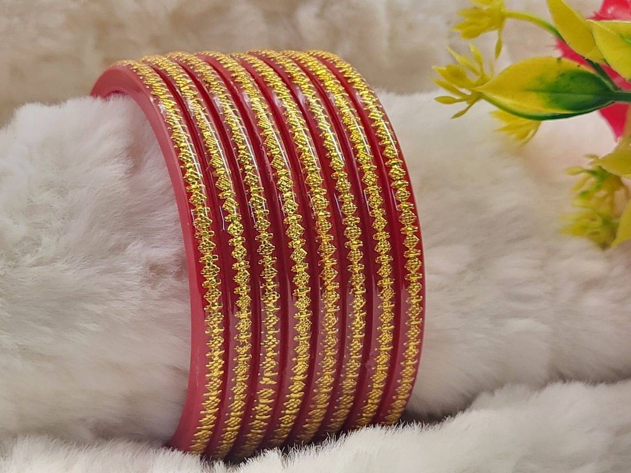     			DHANOTIYA Red Bangle Set ( Pack of 8 )