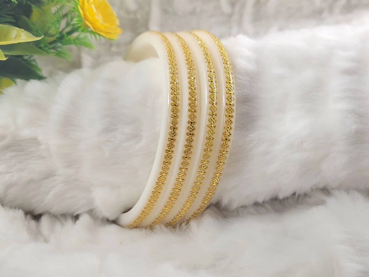 DHANOTIYA White Bangle Set ( Pack of 4 ) DHANOTIYA White Bangle Set ( Pack of 4 )