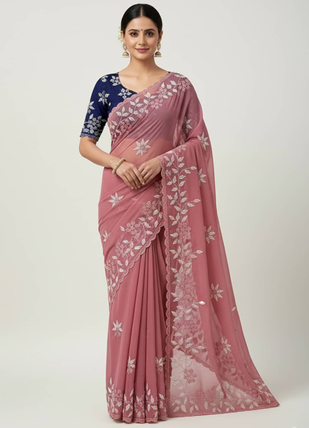 Nayanthara Trends Georgette Embroidered Regular Saree With Unstitched Blouse Piece ( Peach )     			Nayanthara Trends Georgette Embroidered Regular Saree With Unstitched Blouse Piece ( Peach )