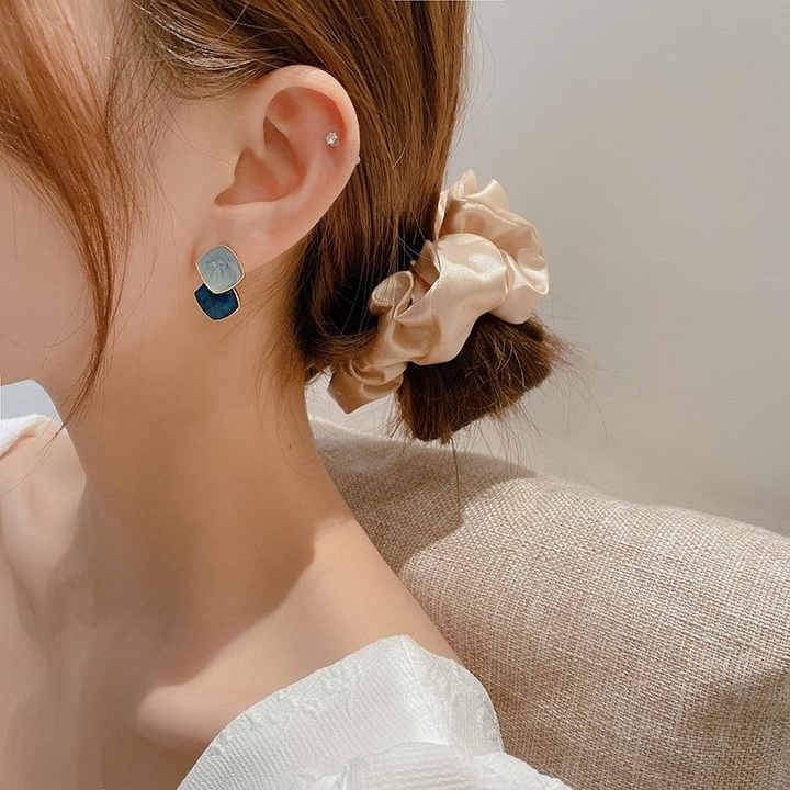     			Adornity Blue Stud Earrings ( Pack of 1 )