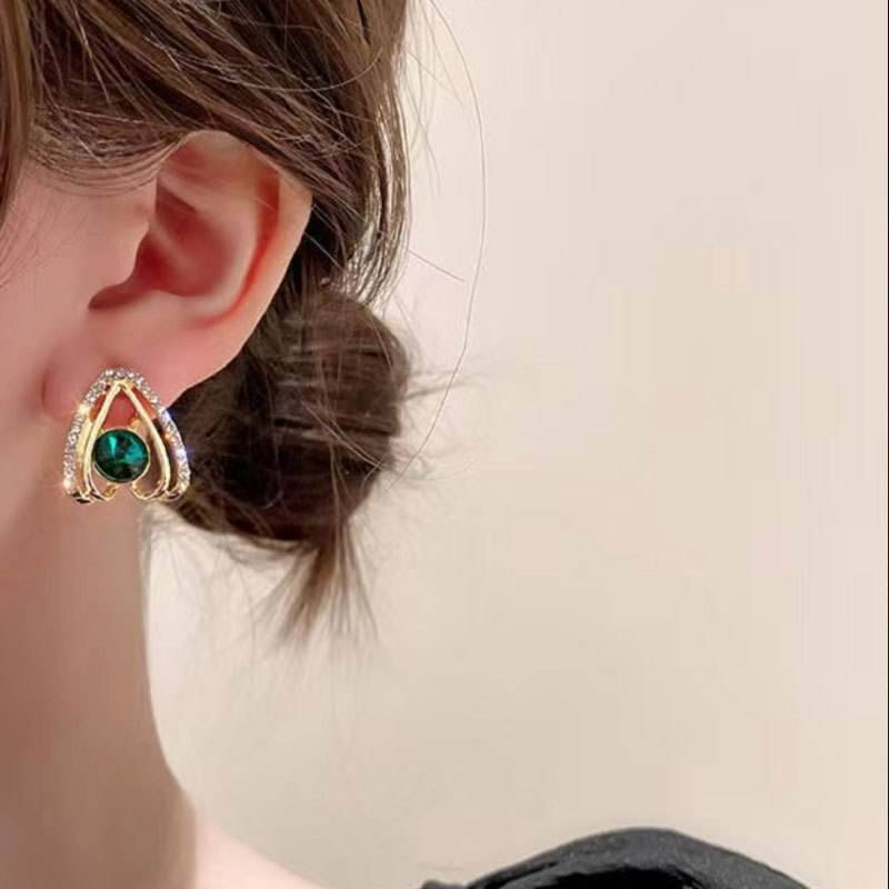     			Adornity Blue Stud Earrings ( Pack of 1 )