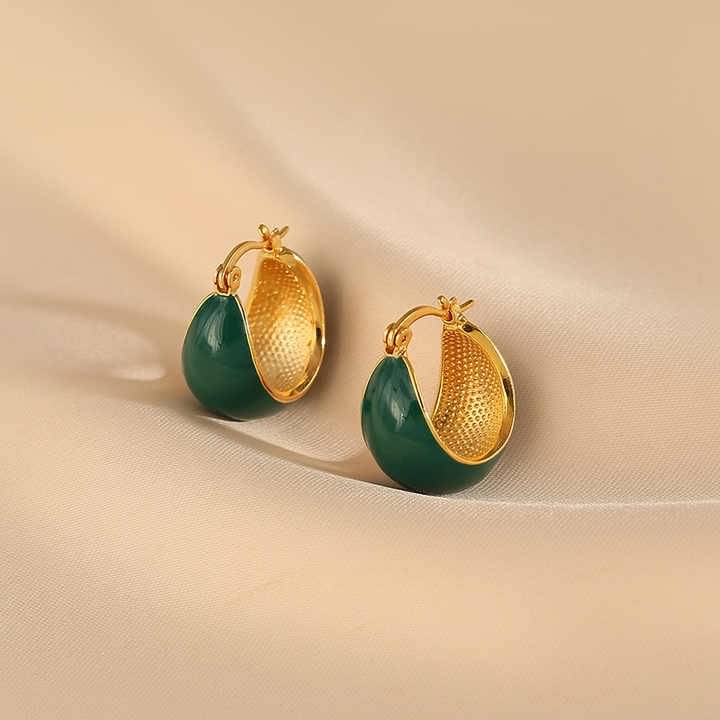     			Adornity Green Stud Earrings ( Pack of 1 )