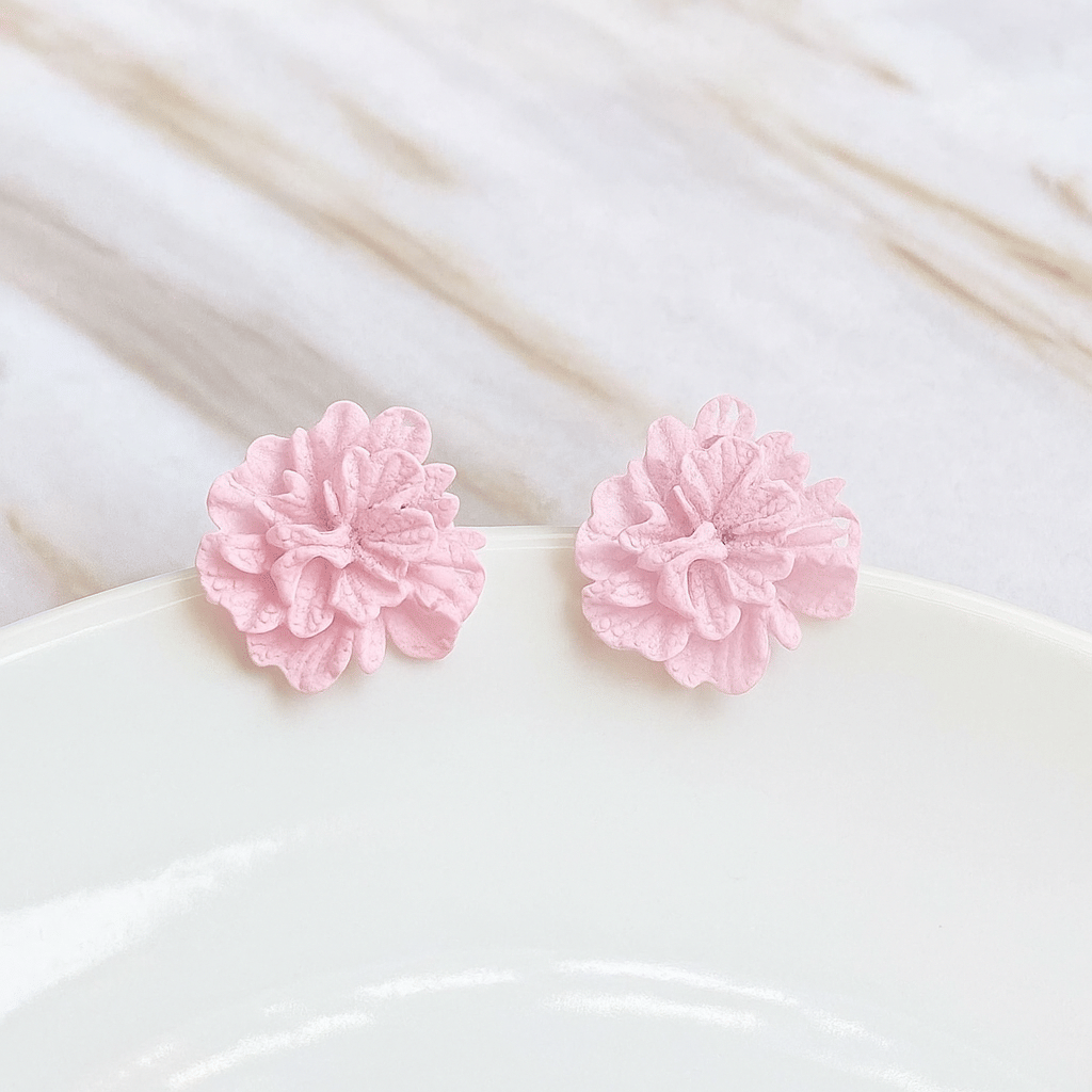     			Adornity Pink Stud Earrings ( Pack of 1 )