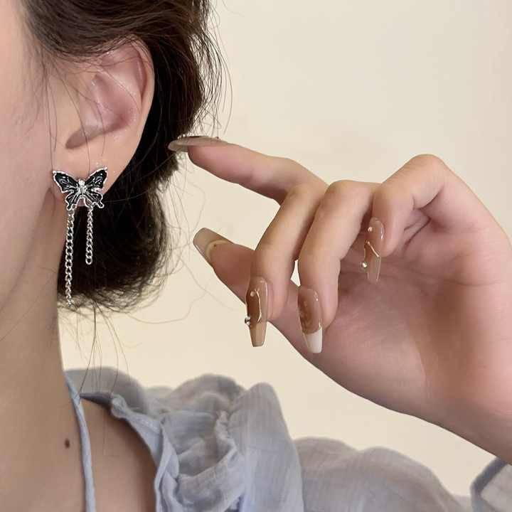     			Adornity Silver Stud Earrings ( Pack of 1 )