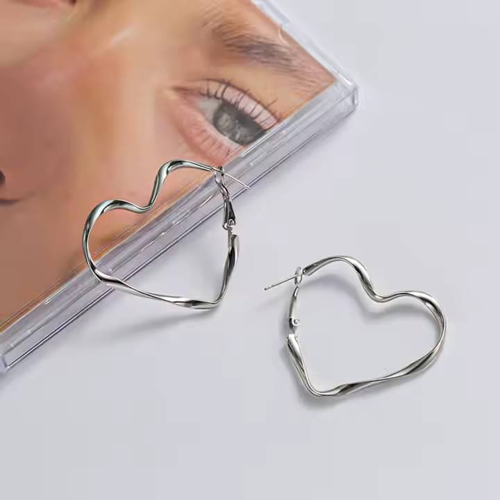     			Adornity Silver Stud Earrings ( Pack of 1 )