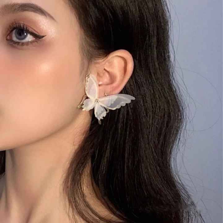     			Adornity White Stud Earrings ( Pack of 1 )