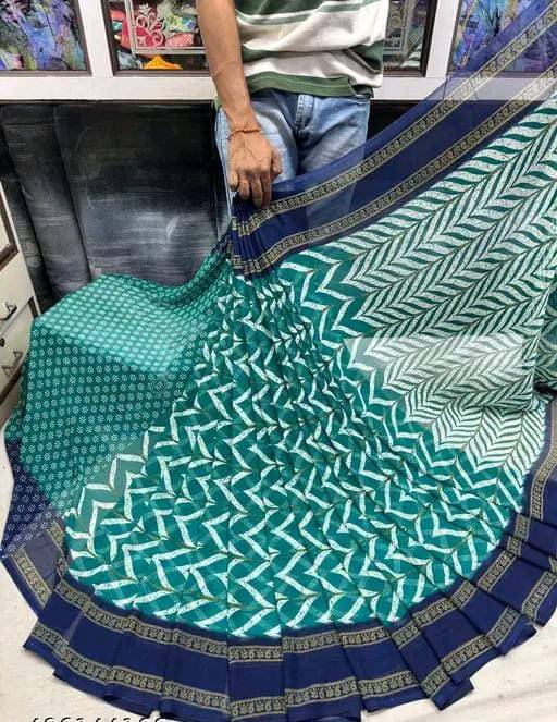 PARVANYA FASHION HUB Georgette Printed Regular Saree With Unstitched Blouse Piece ( Blue ) PARVANYA FASHION HUB Georgette Printed Regular Saree With Unstitched Blouse Piece ( Blue )