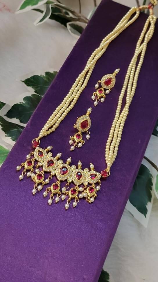     			SAJSHRUNGAR JEWELLERY Pink Copper Necklace Set ( Pack of 1 )