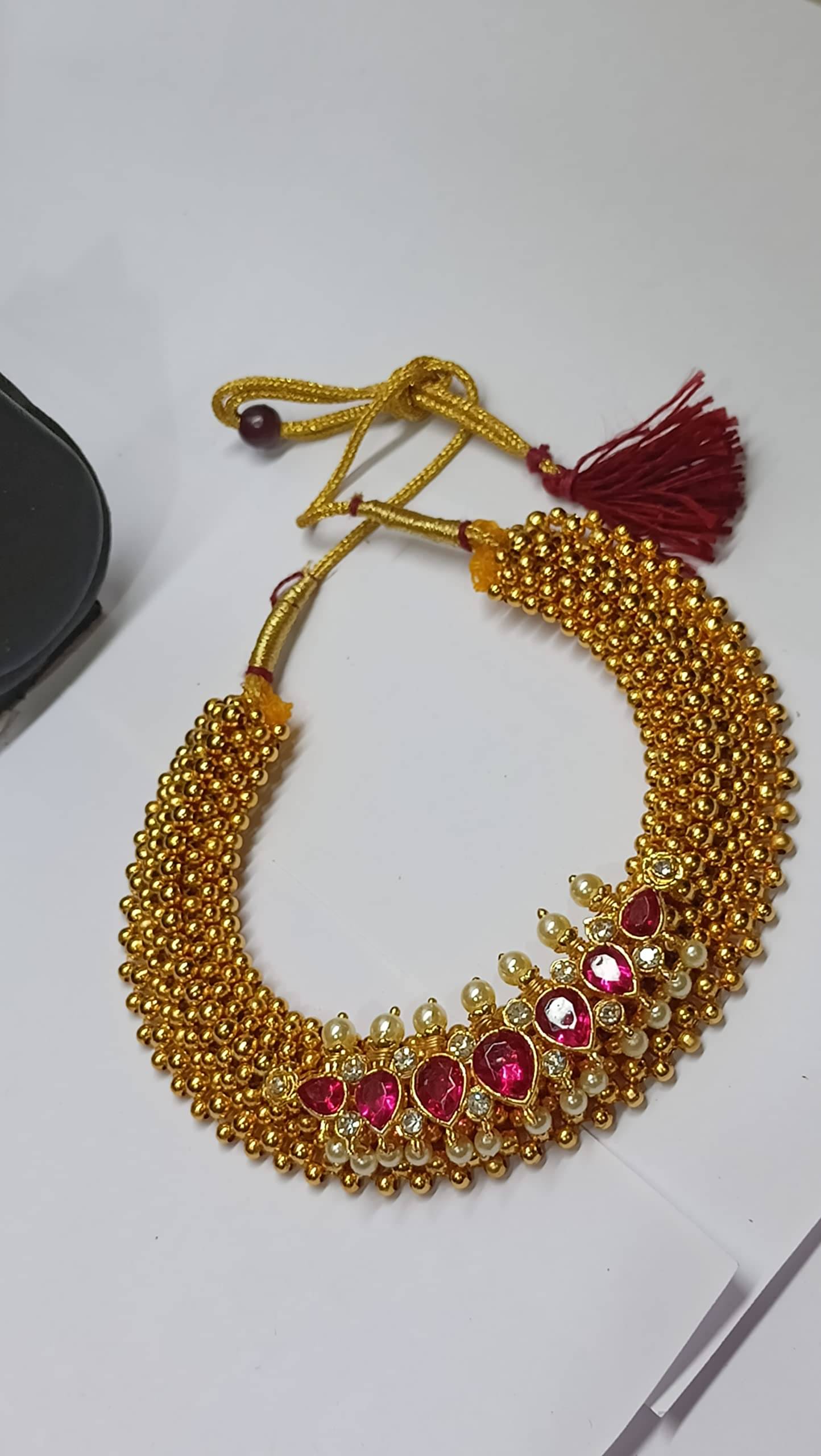     			SAJSHRUNGAR JEWELLERY Red Copper Necklace ( Pack of 1 )
