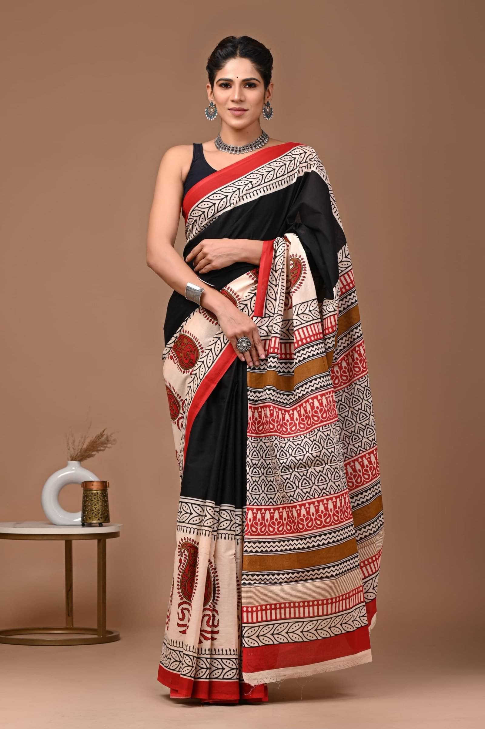 Lovwear Cotton Printed Regular Saree With Unstitched Blouse Piece ( Red,Black,Cream ) Lovwear Cotton Printed Regular Saree With Unstitched Blouse Piece ( Red,Black,Cream )