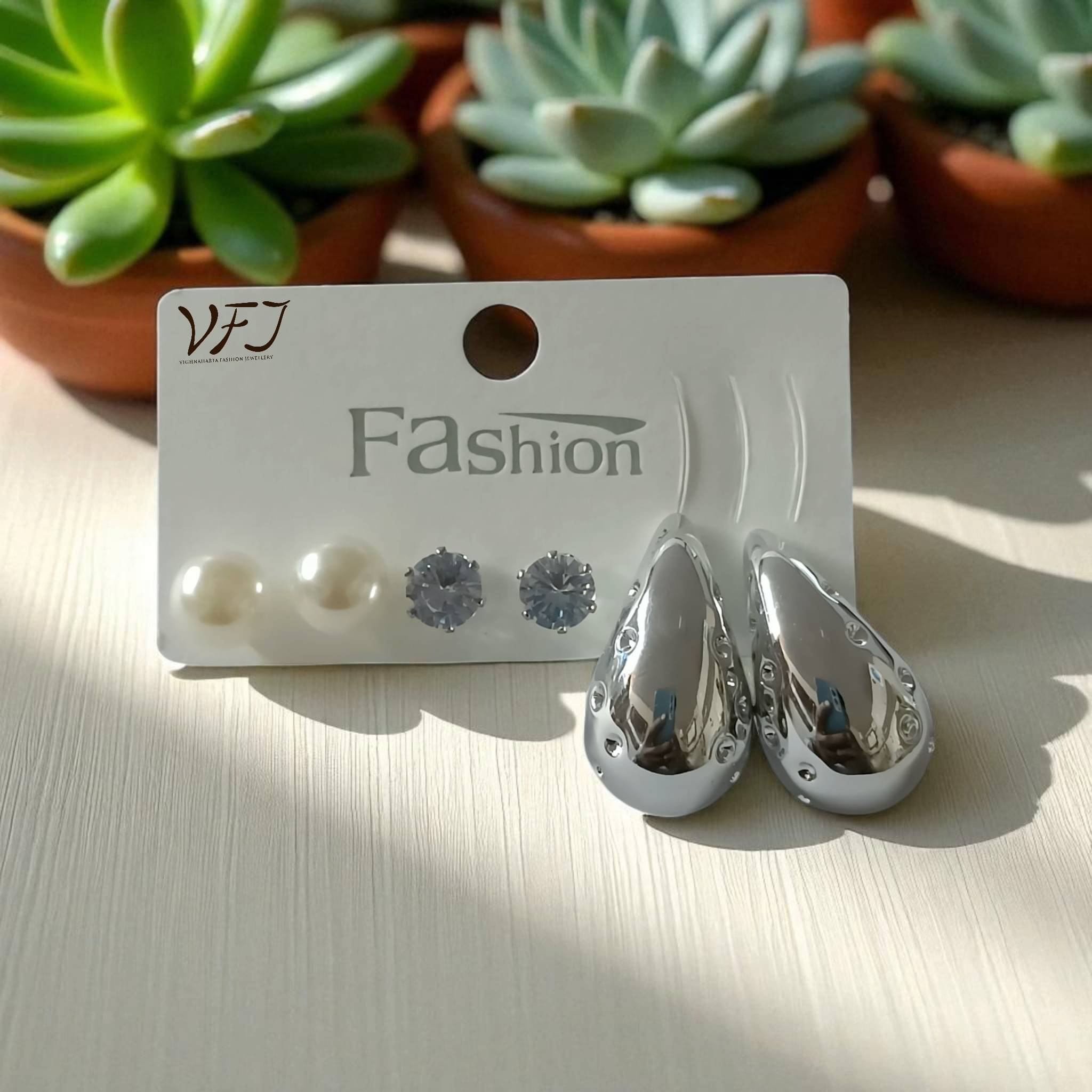    			Vighnaharta Silver Stud Earrings ( Pack of 1 )