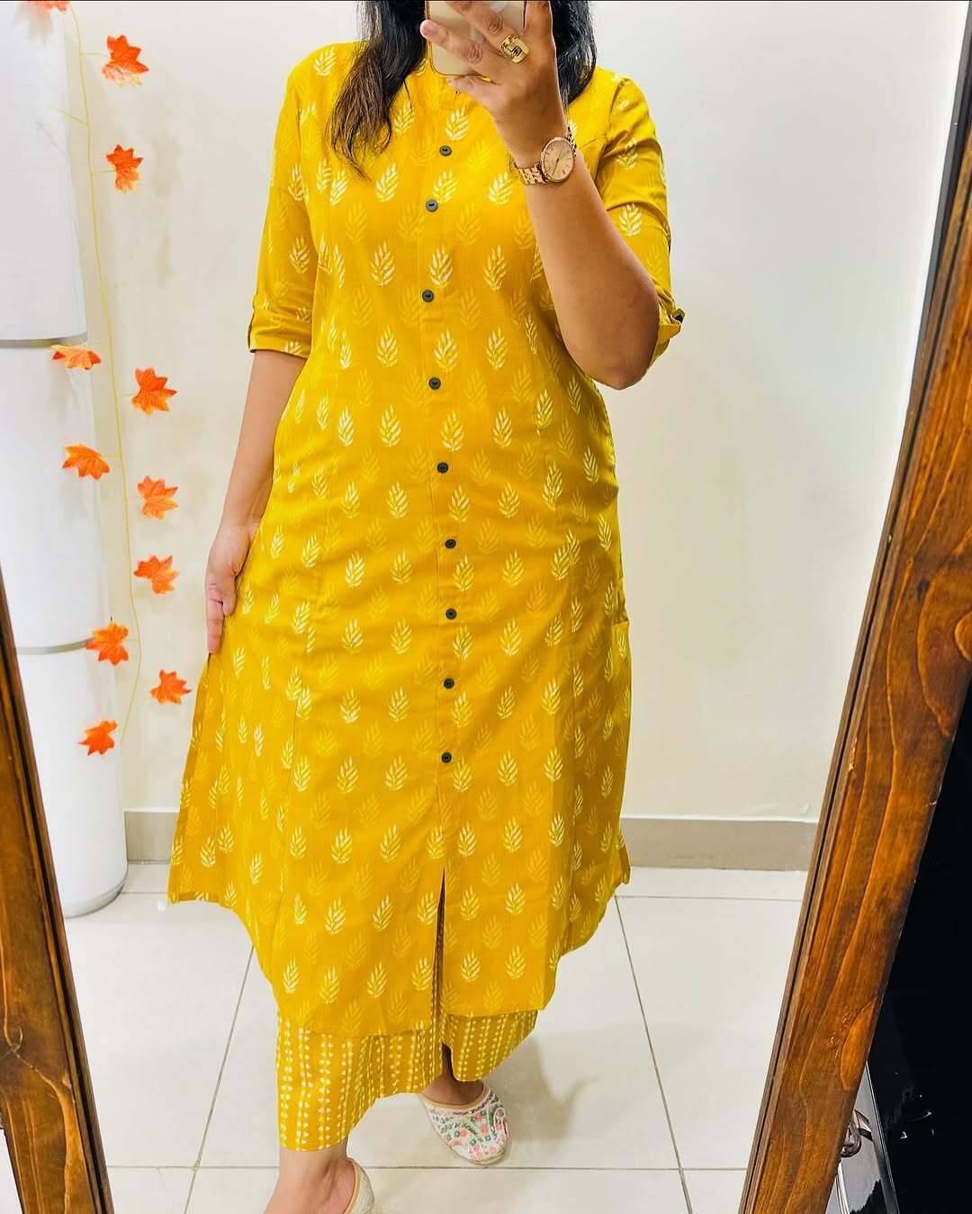 Himaksh Collection Women Cotton Blend Solid Front Slit Kurti With Pants ( Yellow ) Himaksh Collection Women Cotton Blend Solid Front Slit Kurti With Pants ( Yellow )