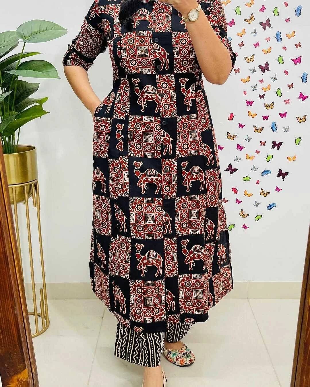 Himaksh Collection Women Cotton Blend Printed Front Slit Kurti With Pants ( Black ) Himaksh Collection Women Cotton Blend Printed Front Slit Kurti With Pants ( Black )