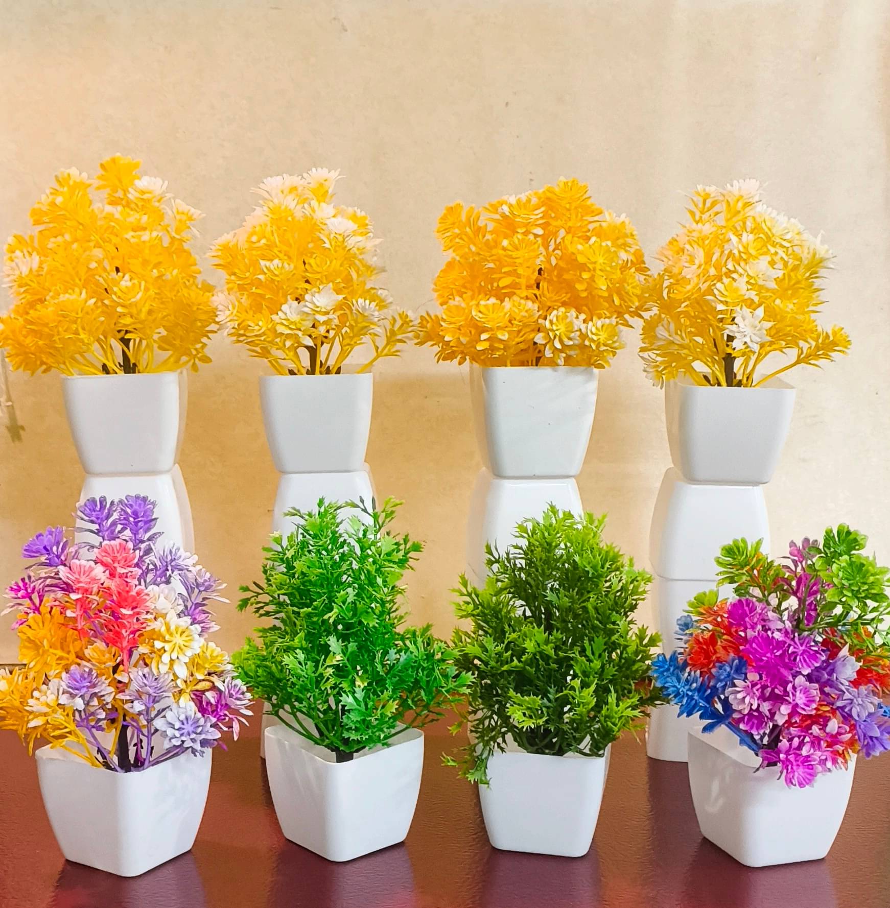     			yellow and mix artificial flowers with pot small and lite pack of 8