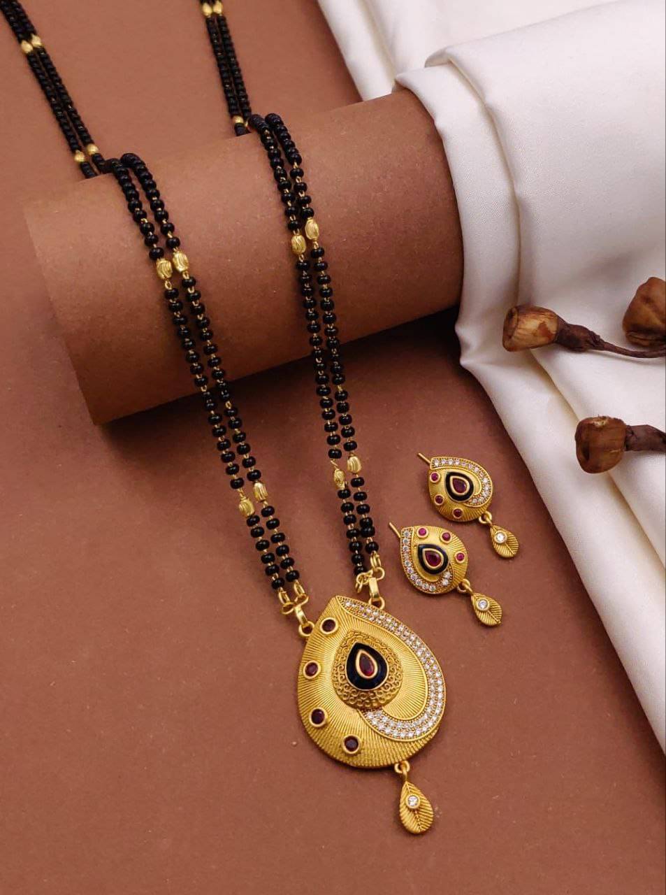 Shivay Fashion hub Golden Mangalsutra Set ( Pack of 1 ) Shivay Fashion hub Golden Mangalsutra Set ( Pack of 1 )