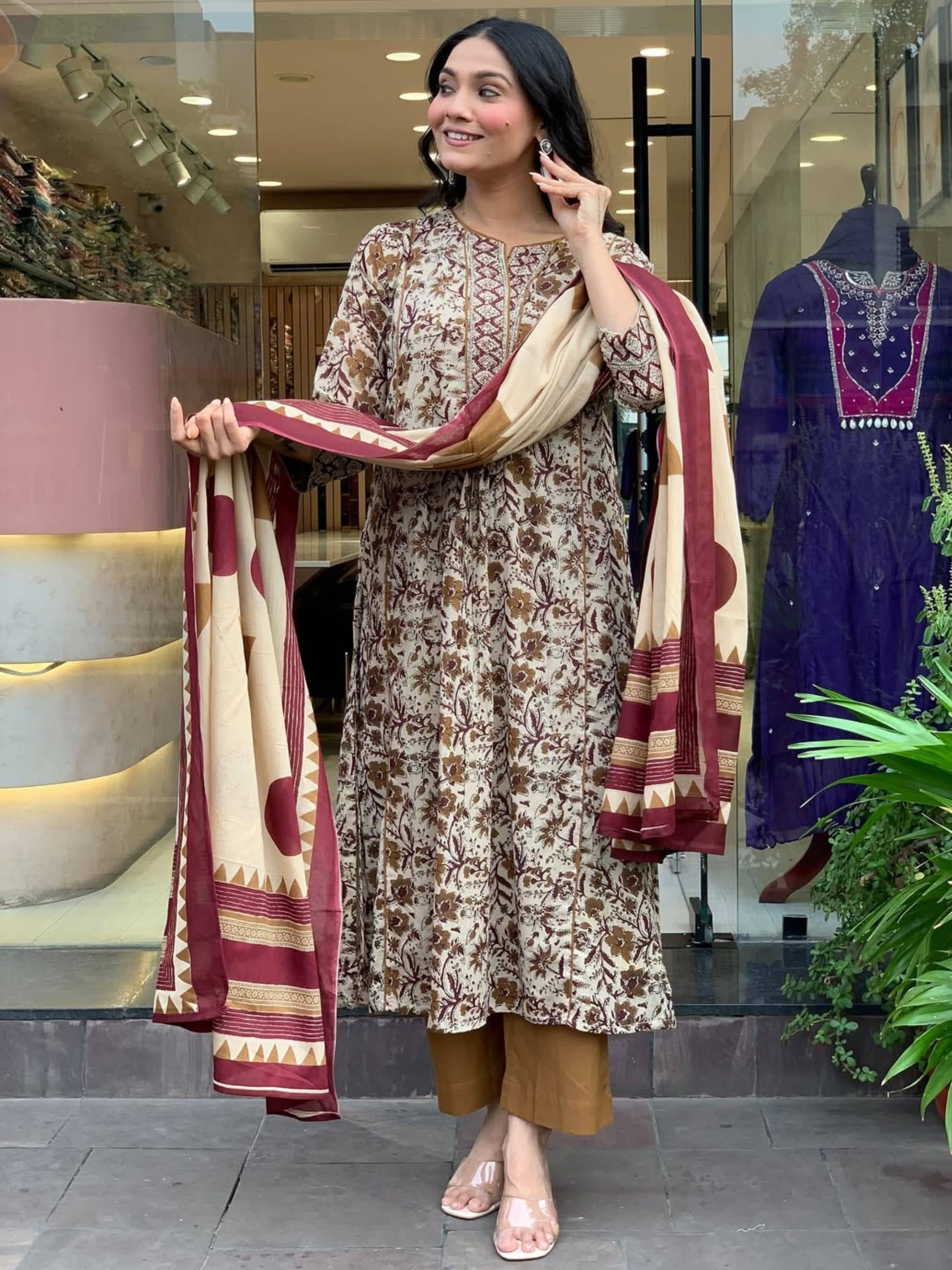 Niza Fashion Women Cotton Embroidered Straight Kurti With Pants ( Brown )
