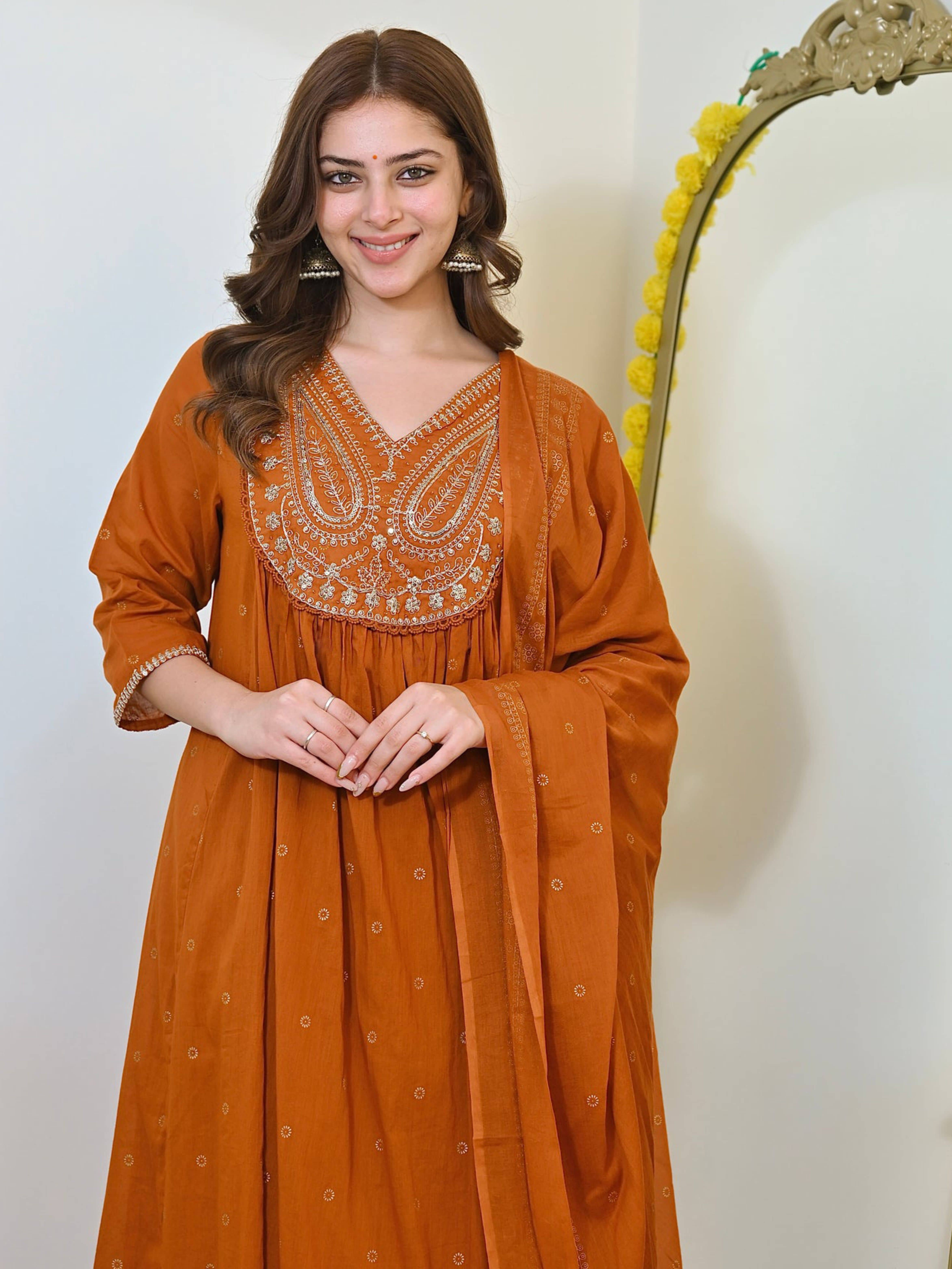 Royal Export Women Viscose Embroidered A-line Kurti With Pants ( Rust )