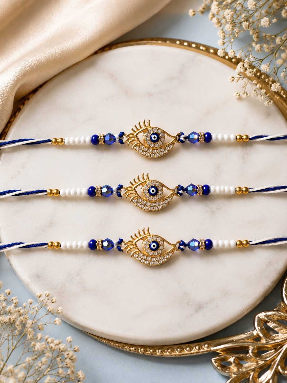 Rhosyn Designer 3 × Evil Eye (Nazar) Rakhis 1 × Greeting Card 1 × Small Roli Pack Adjustable Rakhi ( Pack of 3 , Blue ) - Bangles & Bracelets | Buy online on ZillyBuy